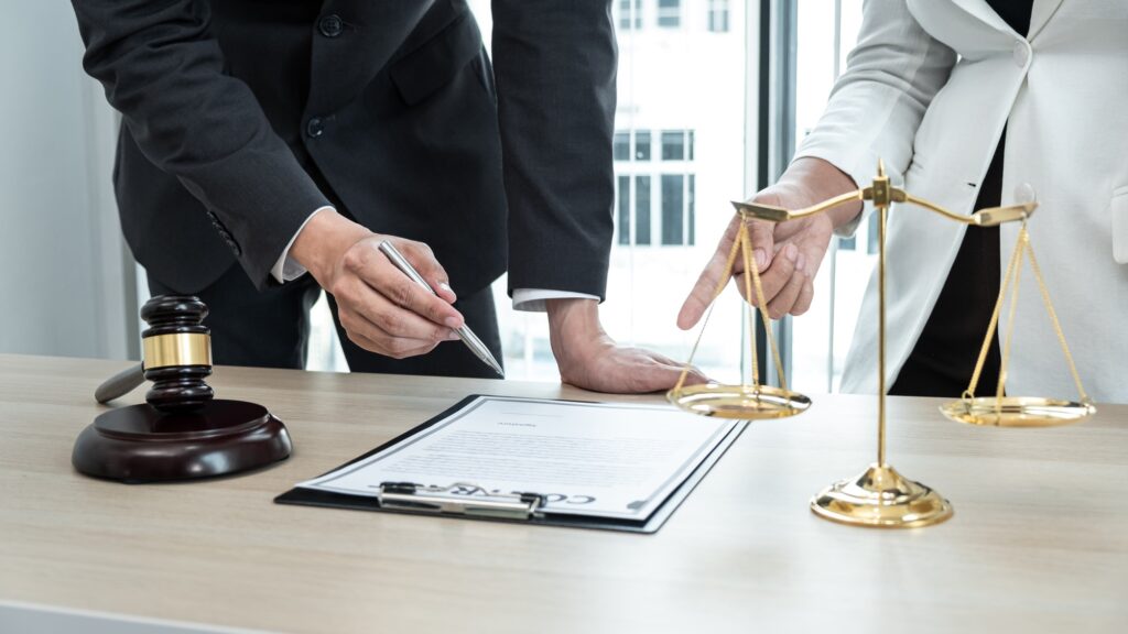 Male lawyer or notary working consulting and discussion to businesswoman client in the office